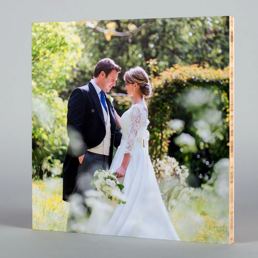 Custom photo wall art of a natural bamboo photo print of a couple on their wedding day