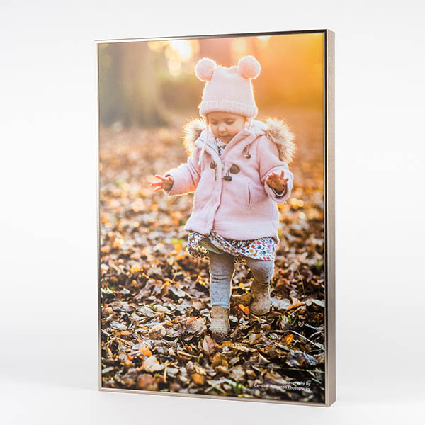Bespoke photo display product of a box photo frame of a little girl in the autumn leaves